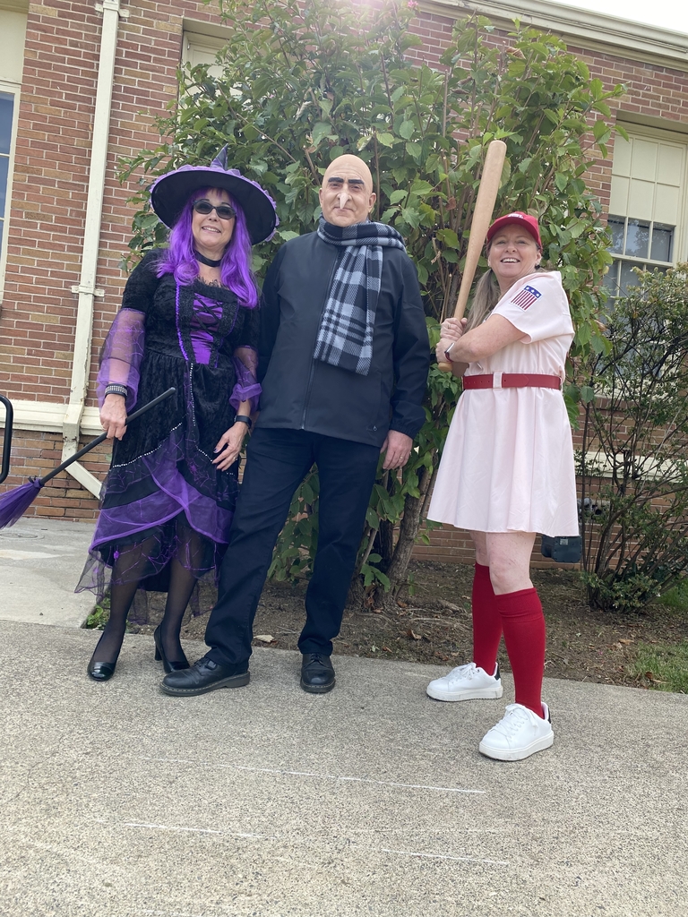Staff dressed as a witch, baseball player and Gru