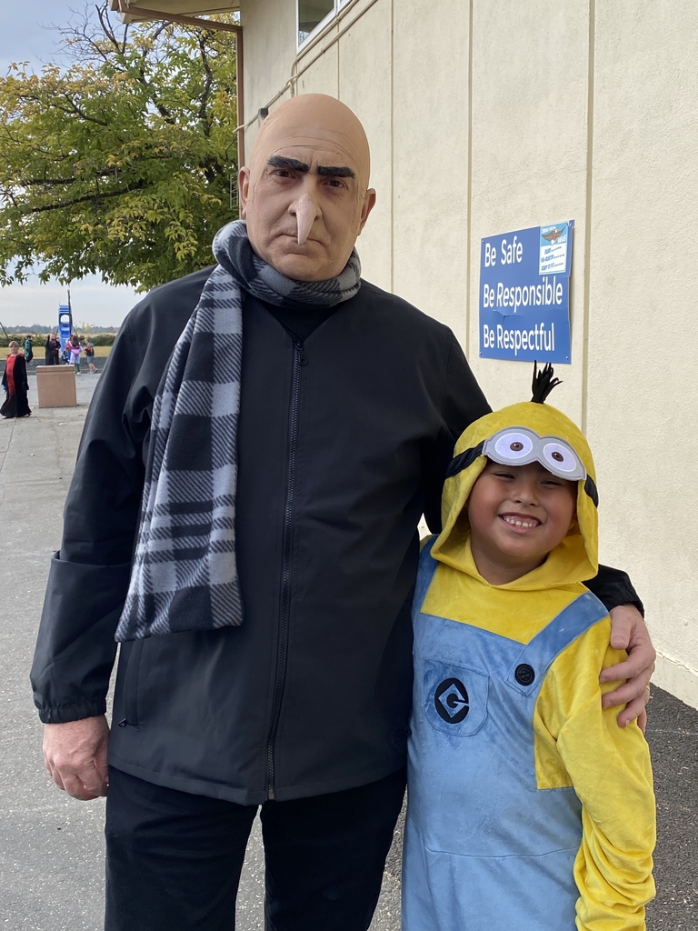 Dr Holtom dressed as Gru and a student dressed as a minion