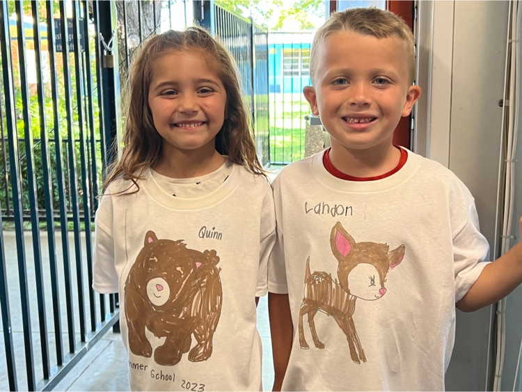 children in artistic shirts 